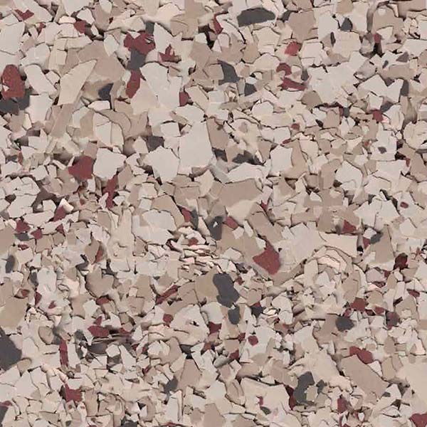 A textured surface with scattered beige, brown, and gray flakes, creating an abstract pattern without recognizable landmarks or buildings.