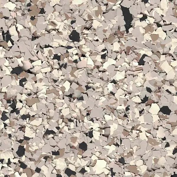 This image shows a close-up view of a surface covered in beige and brown decorative flake chips, often used for flooring.