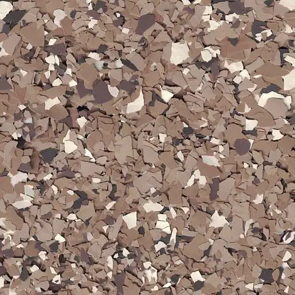 The image shows a close-up of a textured surface with various shades of brown and cream, resembling scattered stones.