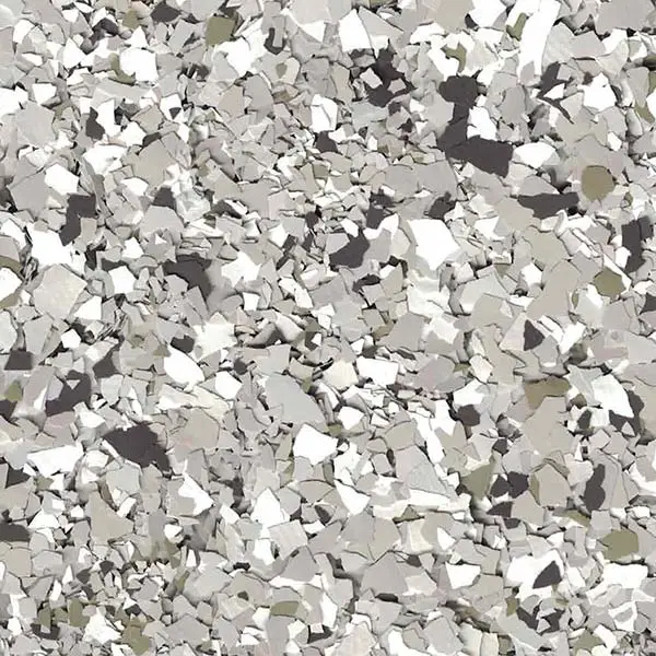 A textured image featuring a pattern of irregular, overlapping white and gray shapes resembling fragmented pieces or abstract stone mosaic artwork.
