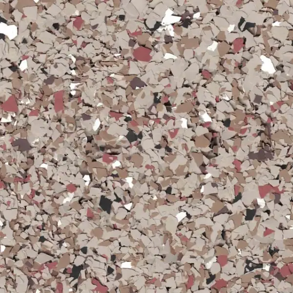 This image shows a close-up of beige, brown, and red paint chips scattered densely on a surface. No recognizable landmarks or people are visible.