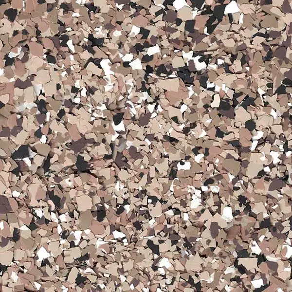 A complex camouflage pattern formed by scattered, multicolored shapes in shades of brown, beige, black, and white, filling the entire image.